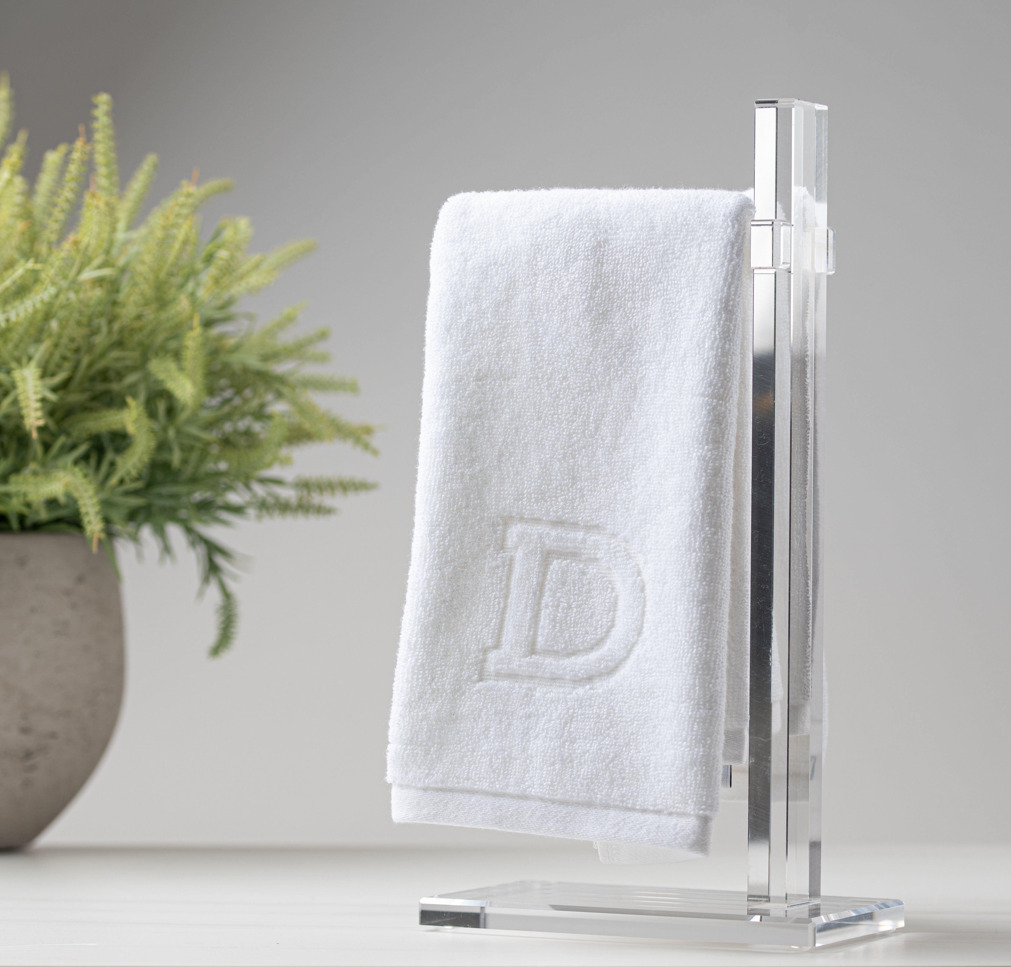 Matouk Monogrammed Towels On Acrylic Towel Stand